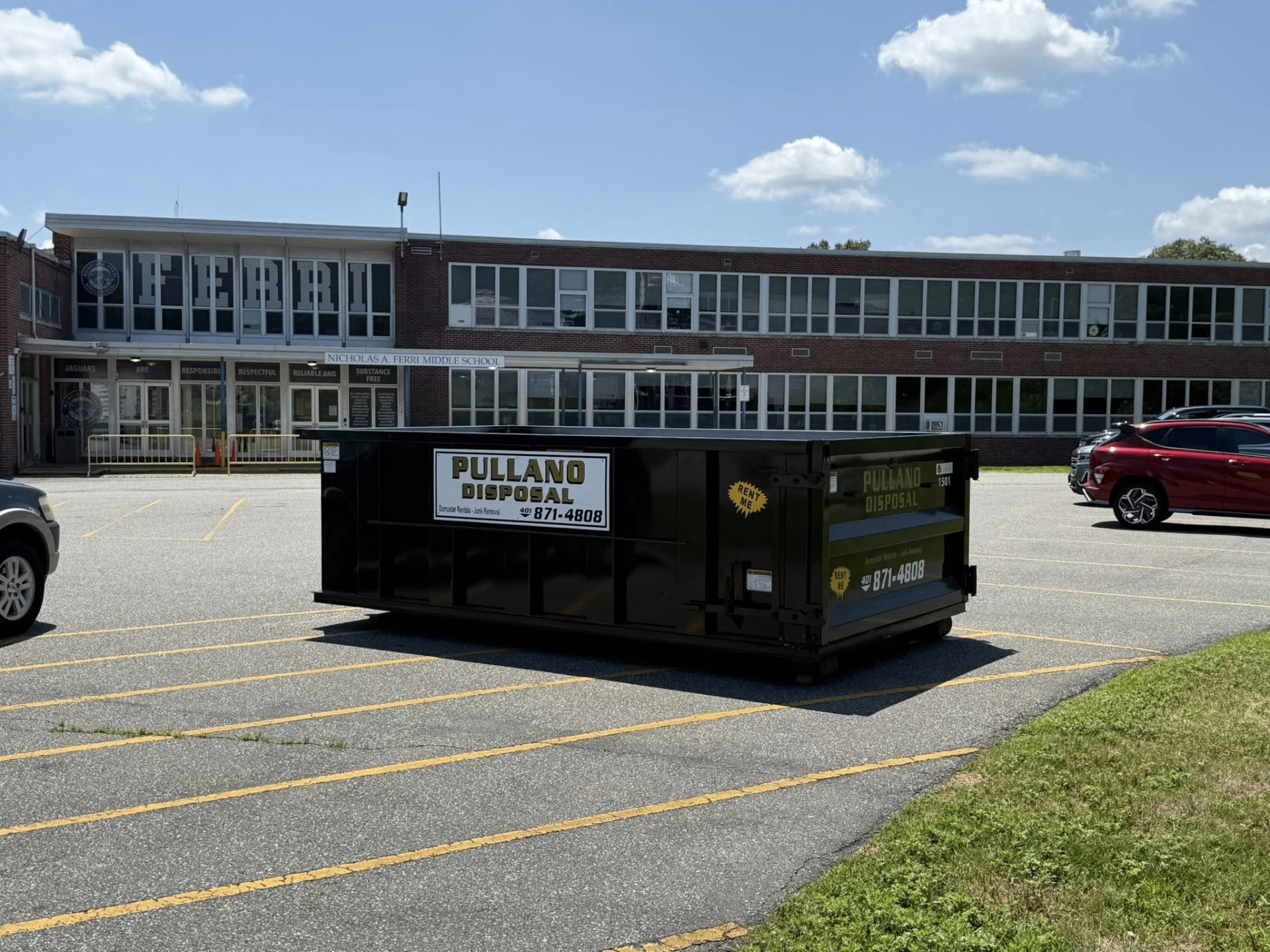 Pullano Disposal dumpster at a commercial location